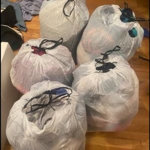 Five bags of clothes and a small bag of shoes